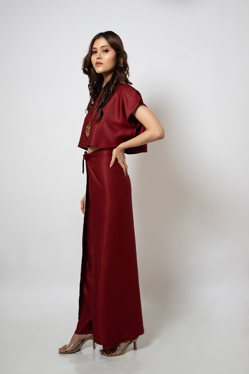 A zero waste red cotton blend crop top and pants co-ord set