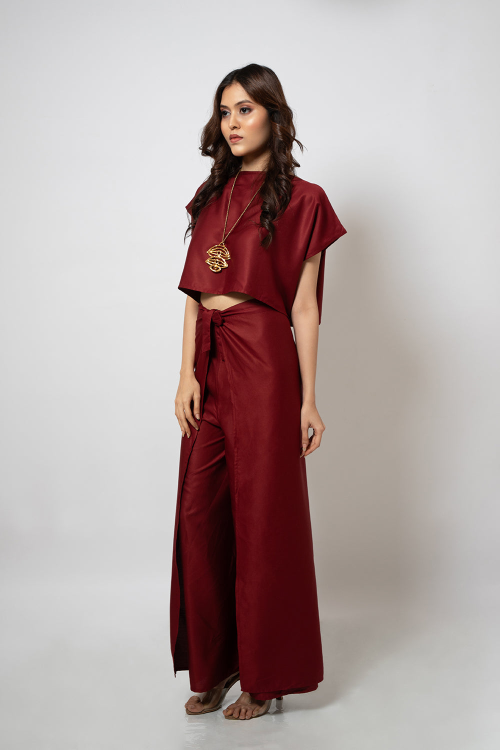 A zero waste red cotton blend crop top and pants co-ord set