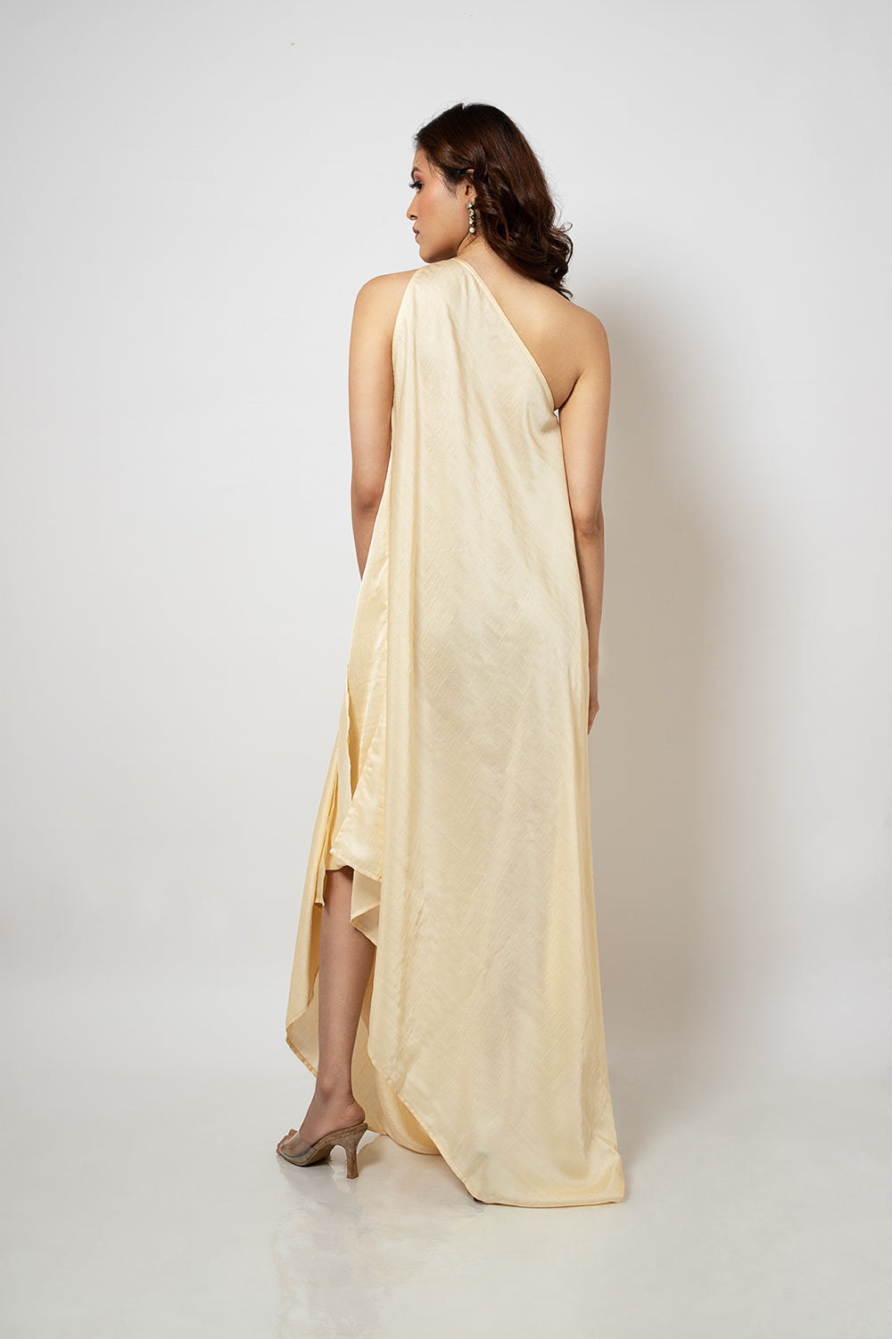 3. A zero waste one shoulder silk blend off white dress