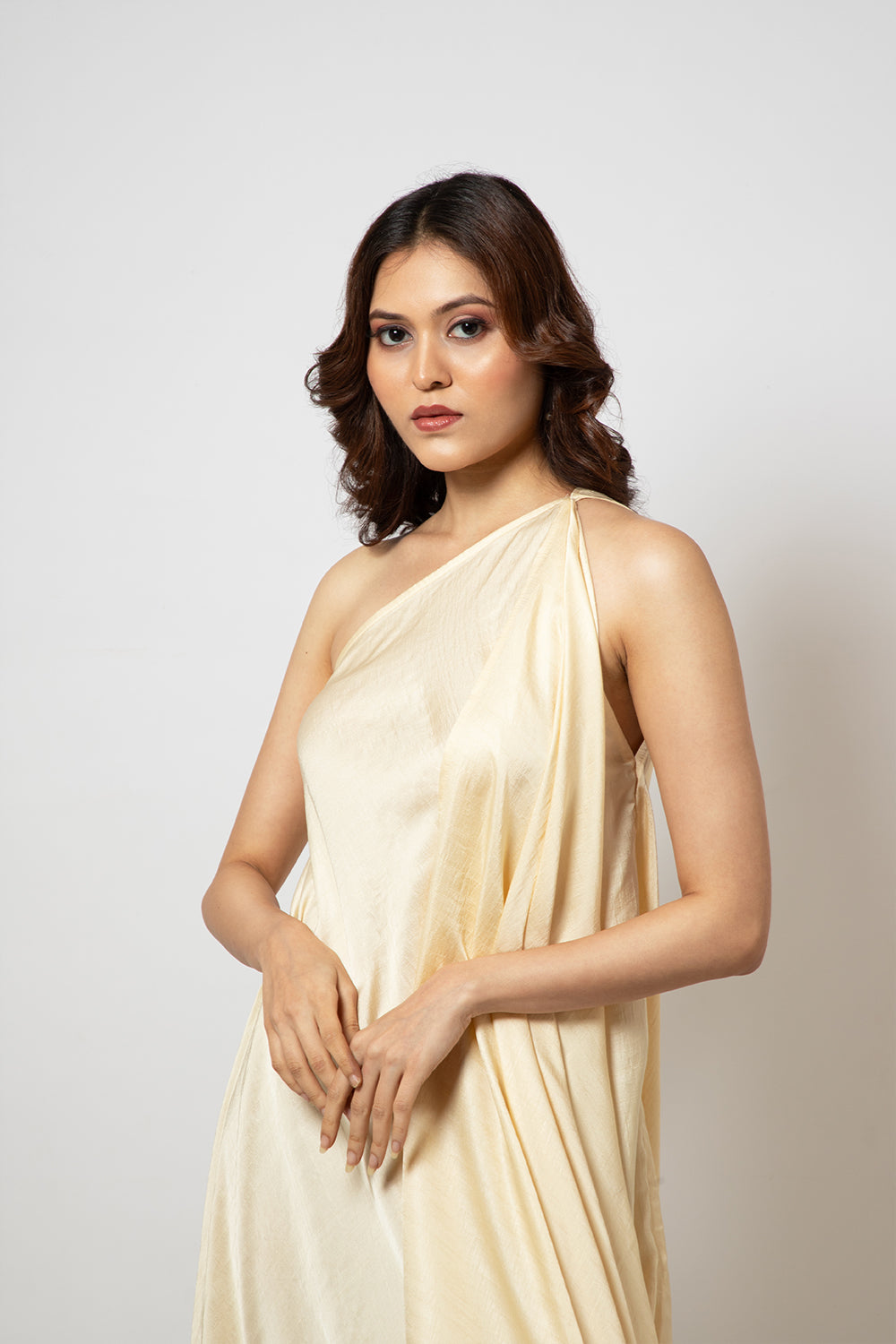 3. A zero waste one shoulder silk blend off white dress