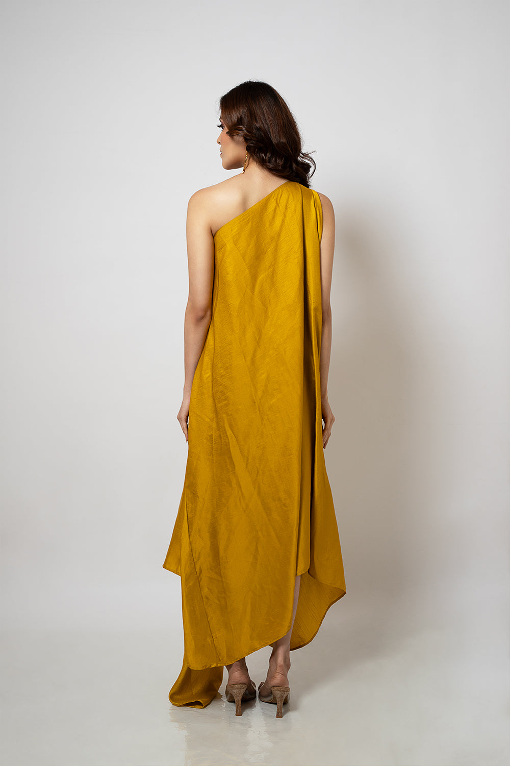 2. A zero waste one shoulder mustard yellow dress