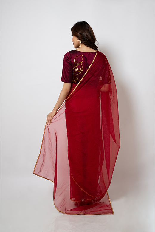 98. Organza Saree with gotapatti border and silk blouse hand painted with artwork inspired from Indian art