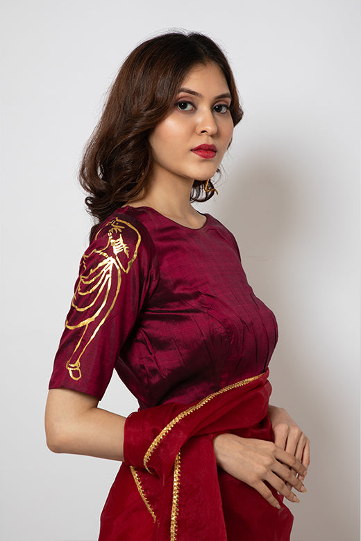 Organza Saree with gotapatti border and silk blouse hand painted with artwork inspired from Indian art
