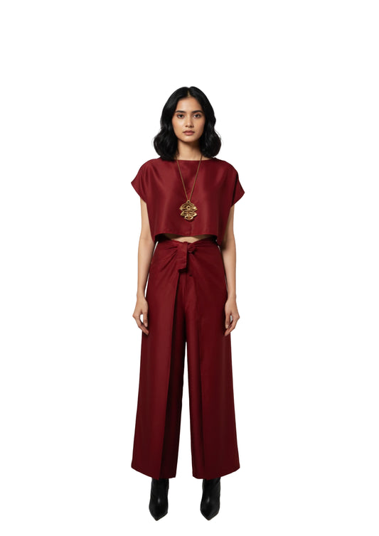 A zero waste red cotton blend crop top and pants co-ord set